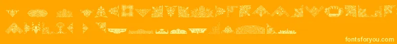 Шрифт VictorianFreeOrnaments – жёлтые шрифты на оранжевом фоне