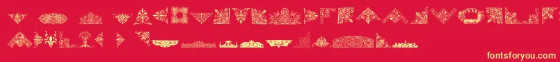 フォントVictorianFreeOrnaments – 黄色の文字、赤い背景