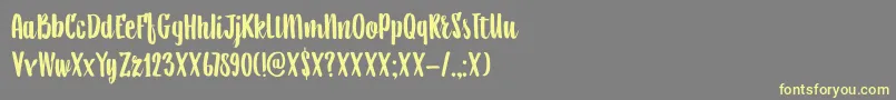 DkAiguille Font – Yellow Fonts on Gray Background