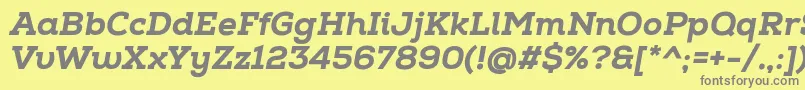 フォントNexaSlabHeavyItalic – 黄色の背景に灰色の文字