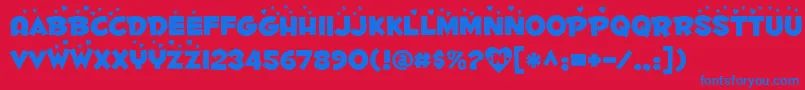 Fontdinerdotcomluvable Font – Blue Fonts on Red Background