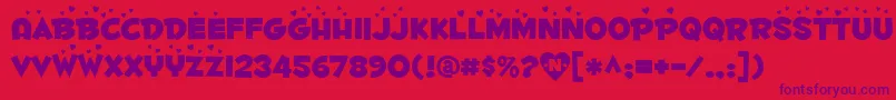 Fontdinerdotcomluvable Font – Purple Fonts on Red Background