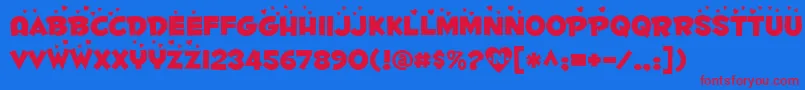 Fontdinerdotcomluvable Font – Red Fonts on Blue Background