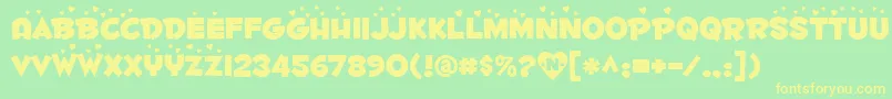 Fontdinerdotcomluvable Font – Yellow Fonts on Green Background