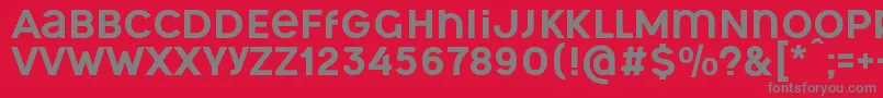 OgonekUnicase-Schriftart – Graue Schriften auf rotem Hintergrund