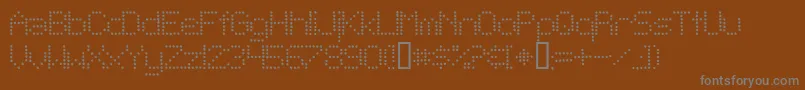 Więcej informacji o czcionce TelegraphicLightBold Czcionka TelegraphicLightBold – szare czcionki na brązowym tle