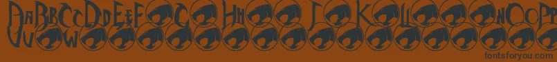 Thundercats Font – Black Fonts on Brown Background