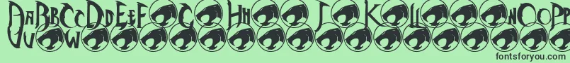 フォントThundercats – 緑の背景に黒い文字