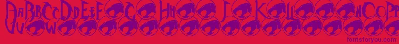 Czcionka Thundercats – fioletowe czcionki na czerwonym tle