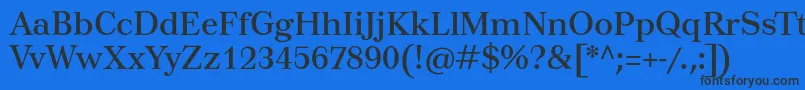 Tusartext Font – Black Fonts on Blue Background