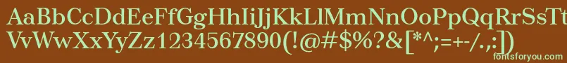 フォントTusartext – 緑色の文字が茶色の背景にあります。