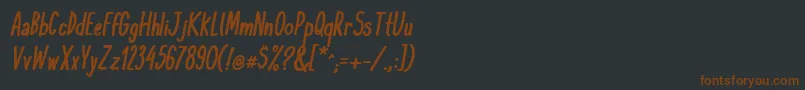 Шрифт KomixconBoldItalic – коричневые шрифты на чёрном фоне