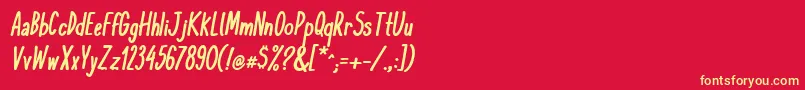 KomixconBoldItalic-fontti – keltaiset fontit punaisella taustalla