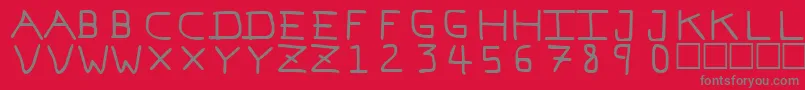 Fonte Pfvvbf7 – fontes cinzas em um fundo vermelho