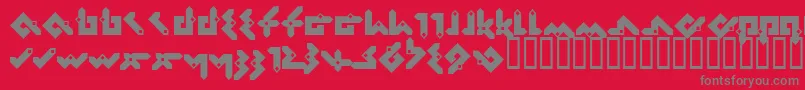 Pentomino-fontti – harmaat kirjasimet punaisella taustalla