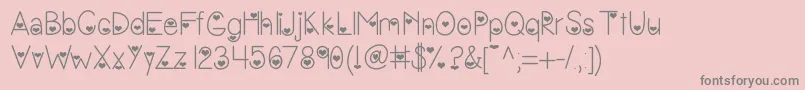 フォントVanessasvalentine – ピンクの背景に灰色の文字