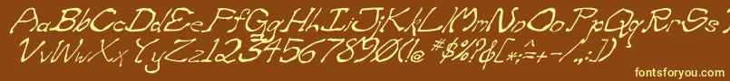 フォントZippitteyItalic – 黄色のフォント、茶色の背景