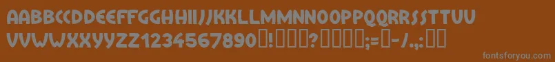 Treai-Schriftart – Graue Schriften auf braunem Hintergrund