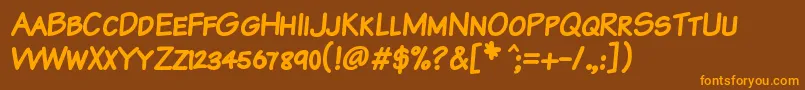 KomikaTextKapsBold Font – Orange Fonts on Brown Background