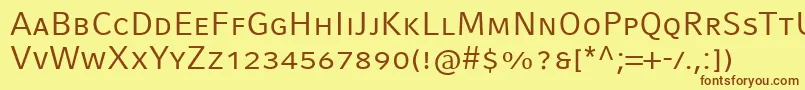 フォントCompatilFactLtComRegularSmallCaps – 茶色の文字が黄色の背景にあります。