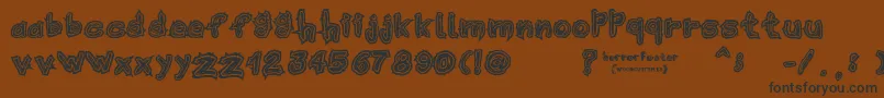 HorrorPoster Font – Black Fonts on Brown Background