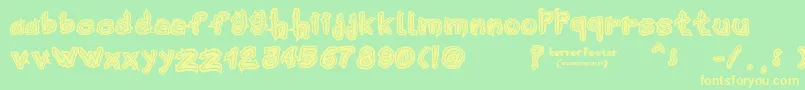 HorrorPoster Font – Yellow Fonts on Green Background