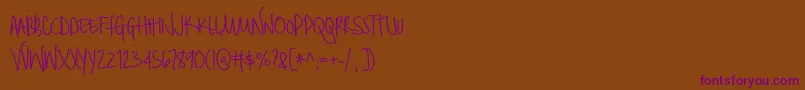 BmdBrilliant Font – Purple Fonts on Brown Background
