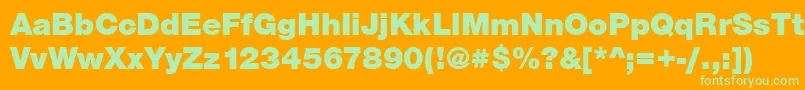 Czcionka Sans ffy – zielone czcionki na pomarańczowym tle