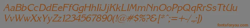 フォントKarinacItalic – 茶色の文字が灰色の背景にあります。