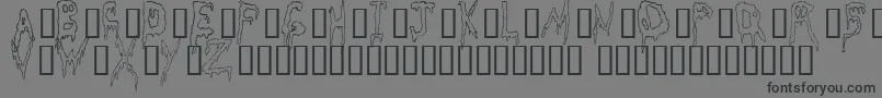 フォントGrossout – 黒い文字の灰色の背景