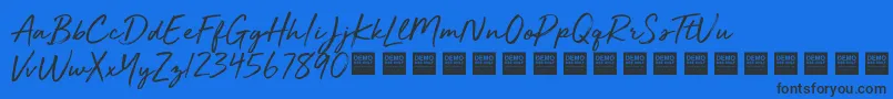 GoldenPlainsDemo Font – Black Fonts on Blue Background