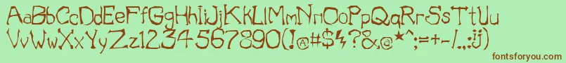 IllOmen Font – Brown Fonts on Green Background