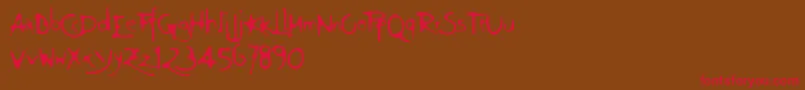 フォントFt75 – 赤い文字が茶色の背景にあります。