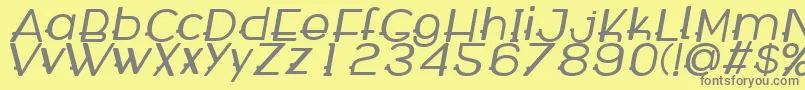WabecoBoldItalic-fontti – harmaat kirjasimet keltaisella taustalla