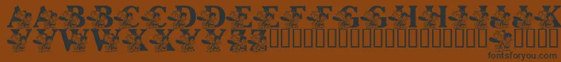 LmsPebblesAndBamBam Font – Black Fonts on Brown Background