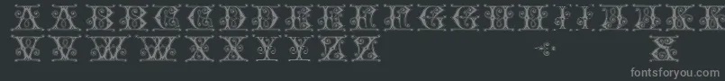 Gingerbread-fontti – harmaat kirjasimet mustalla taustalla