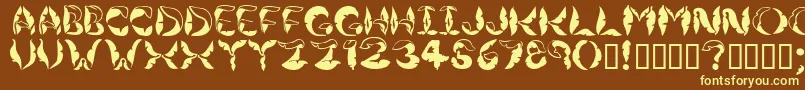 Jungleleaves-fontti – keltaiset fontit ruskealla taustalla
