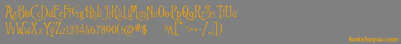 フォントRigoletto – オレンジの文字は灰色の背景にあります。