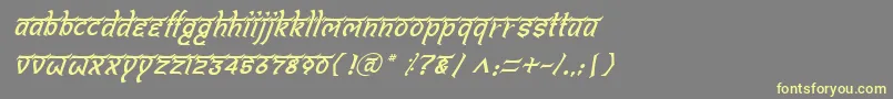 Czcionka BitlingshivomItalic – żółte czcionki na szarym tle