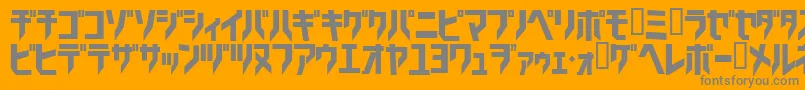 フォントTricrg – オレンジの背景に灰色の文字