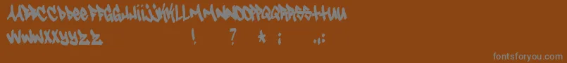 Tagster Font – Gray Fonts on Brown Background
