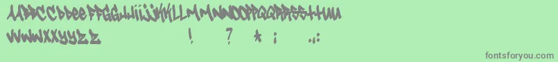 Tagster Font – Gray Fonts on Green Background