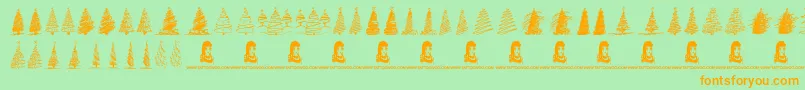 フォントMerryChristmasTrees – オレンジの文字が緑の背景にあります。