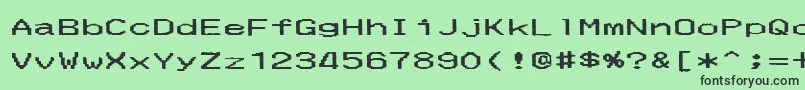 MerchantCopyWide Font – Black Fonts on Green Background