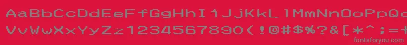 Czcionka MerchantCopyWide – szare czcionki na czerwonym tle