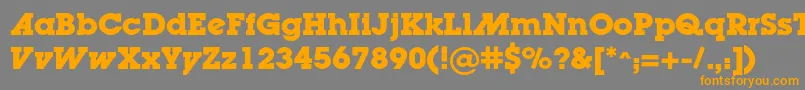 フォントLugaadcBold – オレンジの文字は灰色の背景にあります。
