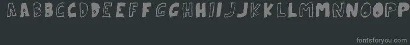フォントParanoidRabbitErcTryout2008 – 黒い背景に灰色の文字