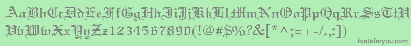 フォントOldWorld – 緑の背景に灰色の文字