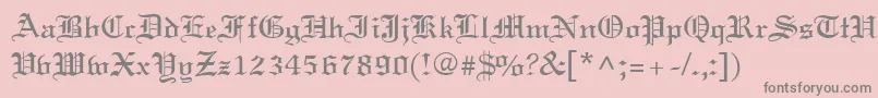 フォントOldWorld – ピンクの背景に灰色の文字