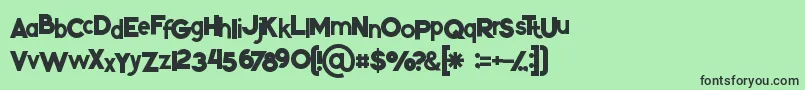Kikoregular-fontti – mustat fontit vihreällä taustalla